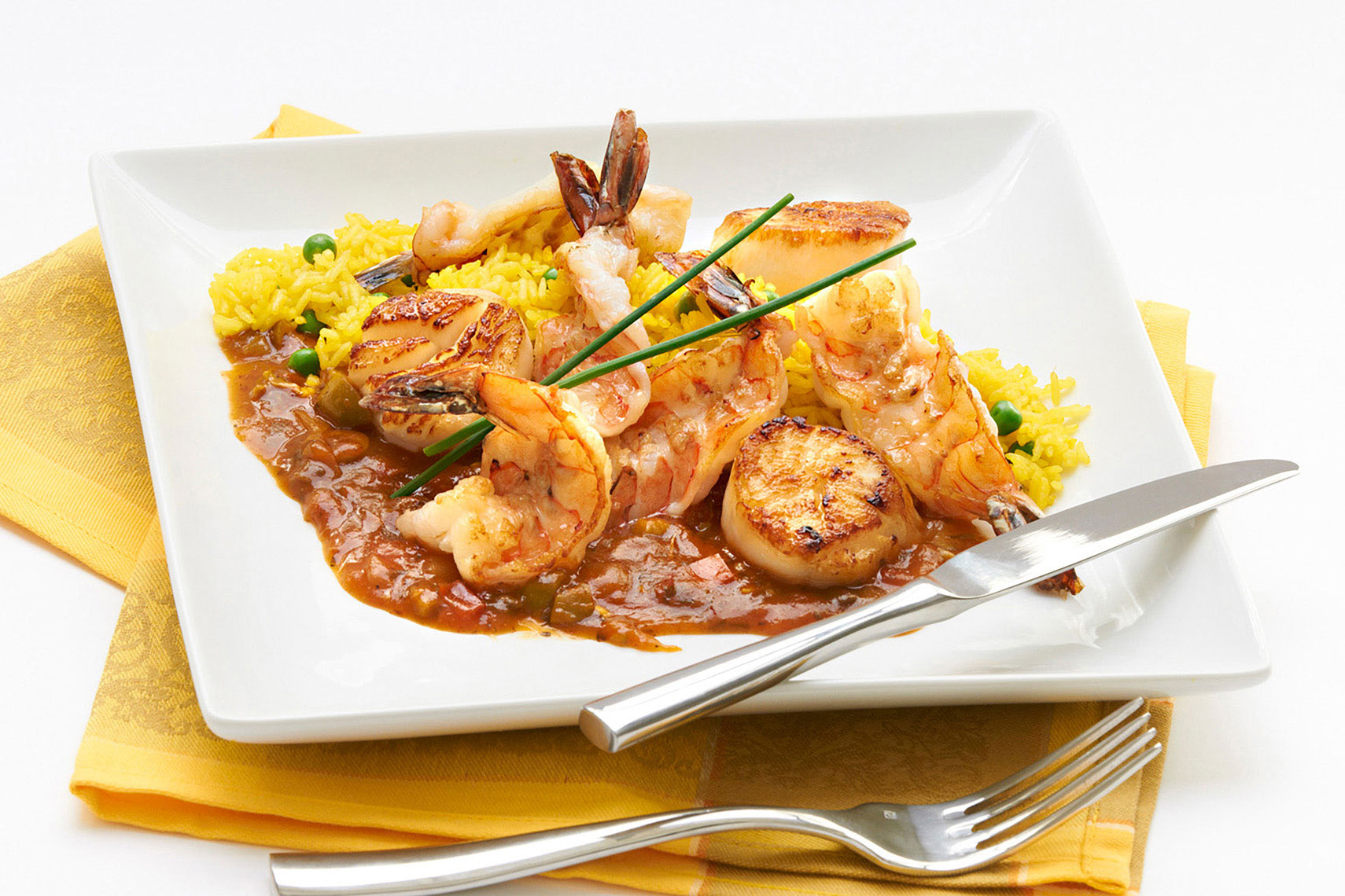 Assian-shrimp-and-scallop-in-red-pepper-sauce-with-safron-rice-by-top-Los-Angeles-food-photographer Joe Atlas.