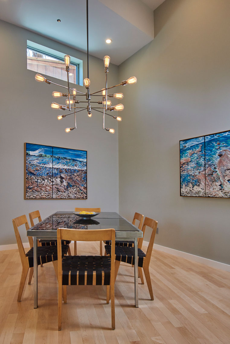 Dining-room-in-contemporary-home-with-pendant-lamp-and-artwork-Joe-Atlas-architectural-photographer-Los-Angeles.
