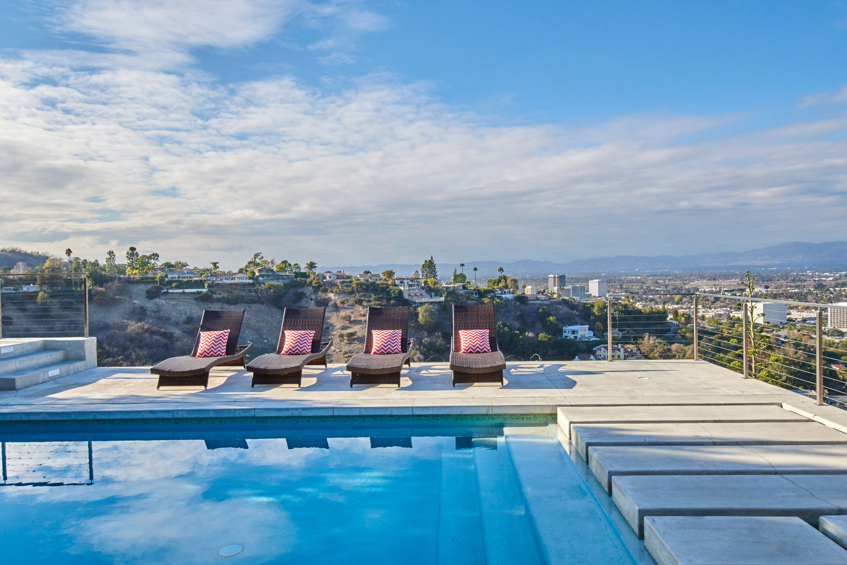 Los-Angeles-California-pool-with-lounge-chairs-and-hillside-views-by-Los-Angeles-architecture photographer