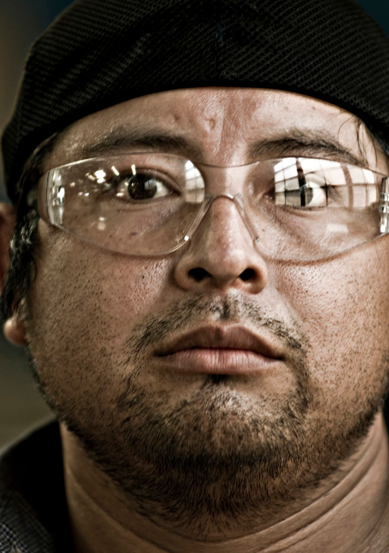 Metal-factory-worker-face-with-safety-goggles-by-environmental-portrait-photographer-Joe-Atlas.