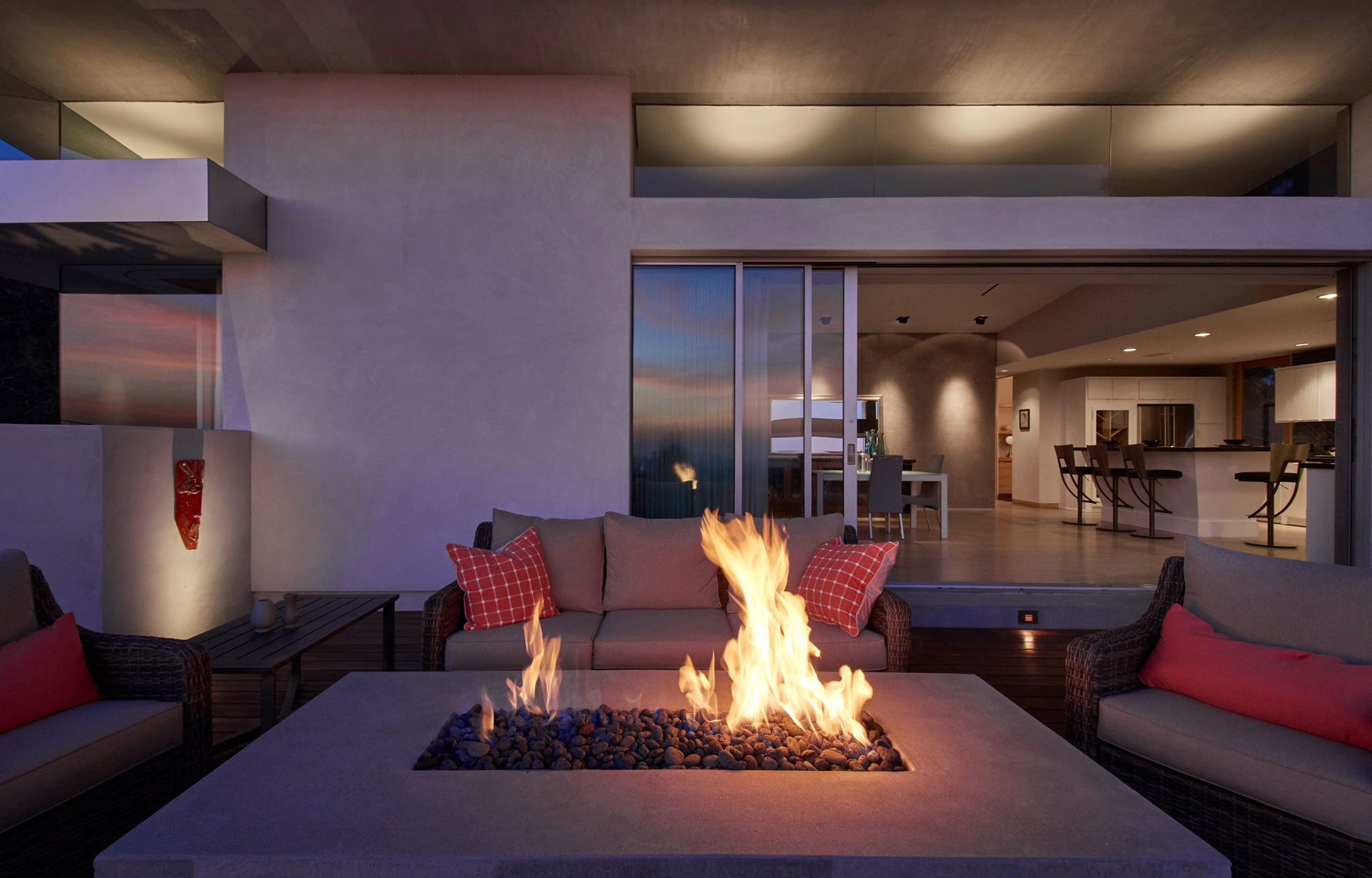 Outdoor-fireplace-with-view-of-contemporary-home-interior-in-background-by-top-Los-Angeles-architecture photographer